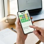 Spotle music guessing game interface showing color-coded attribute clues for identifying a mystery Spotify artist